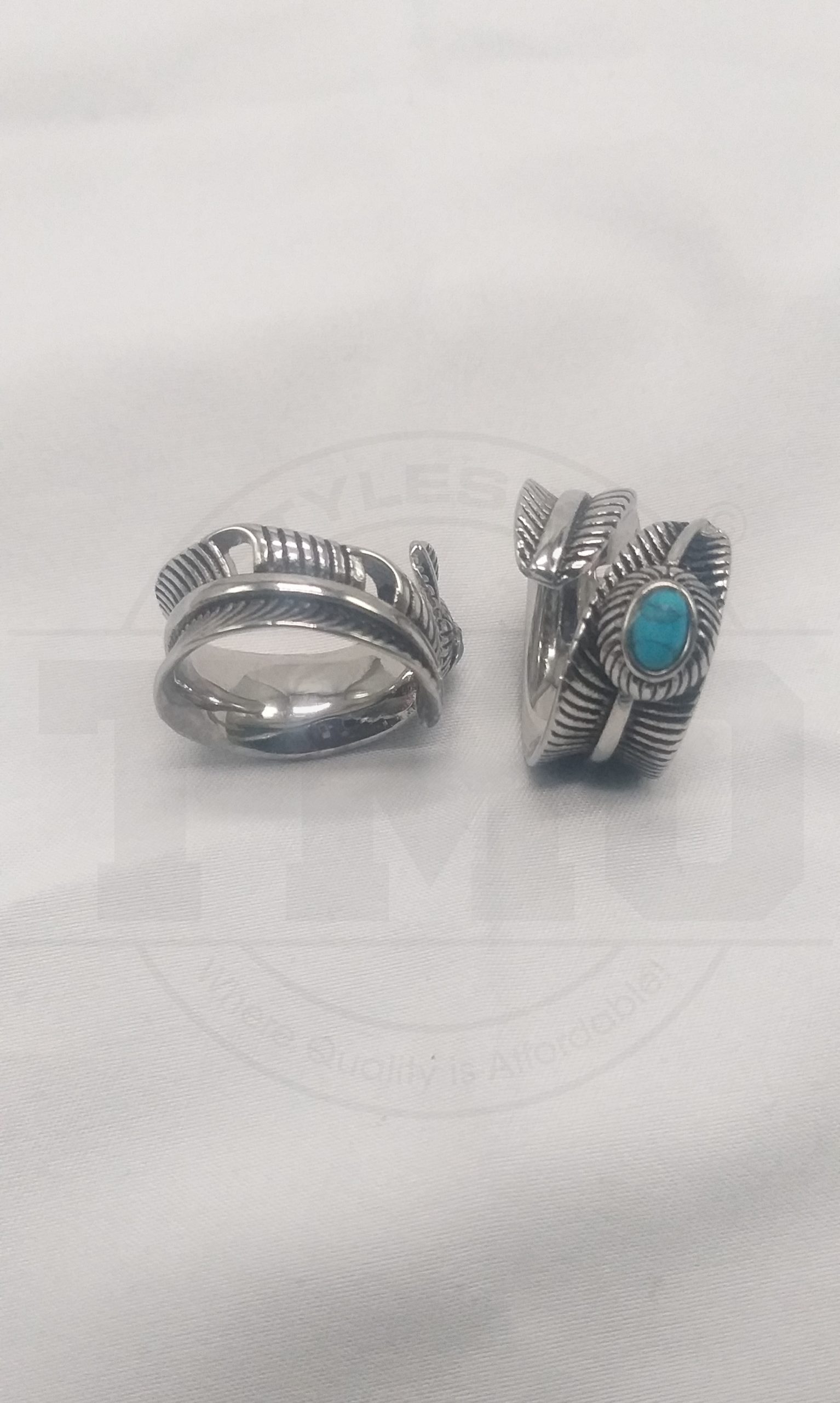 Stainless steel feather ring with dragon stone