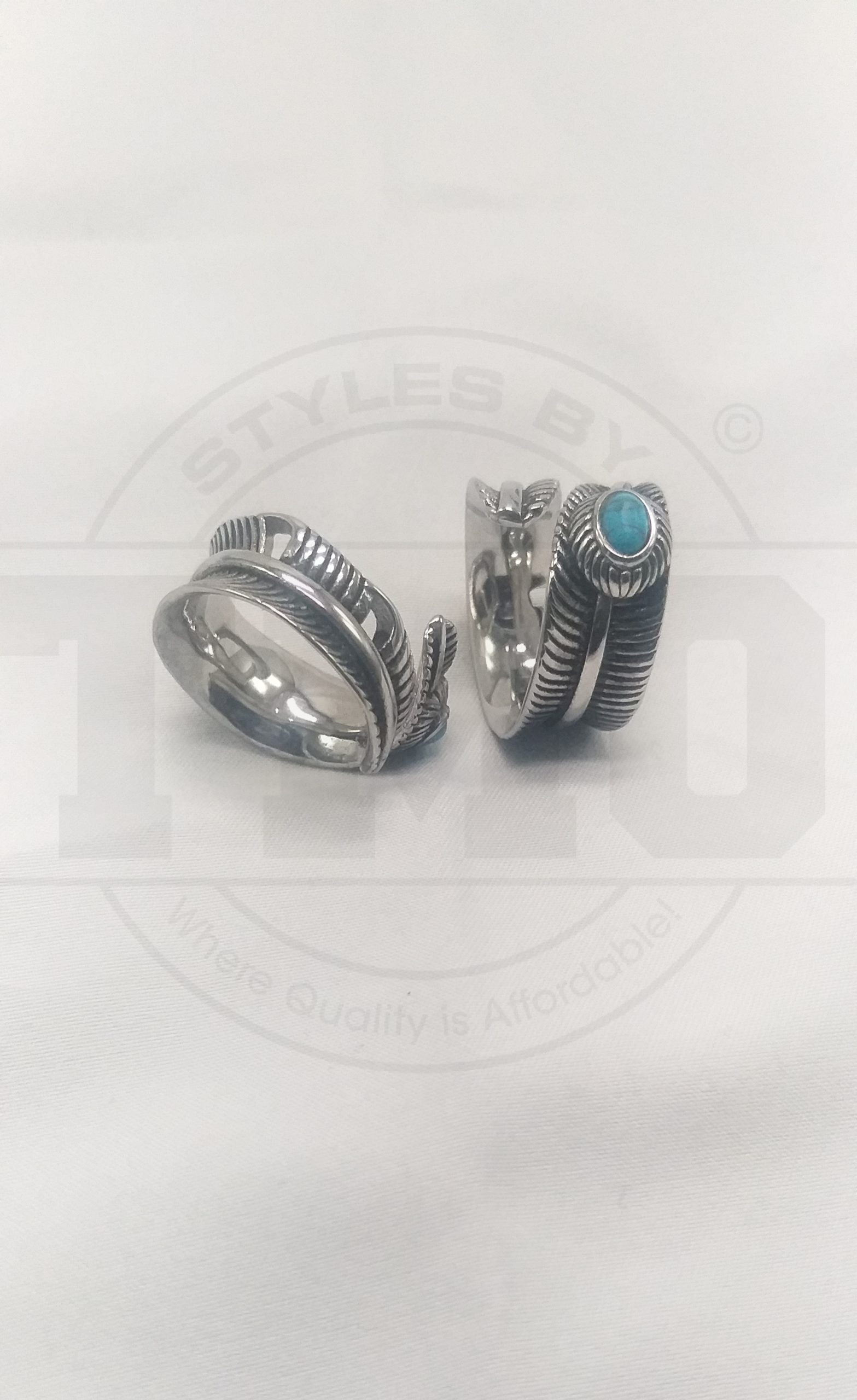 Stainless steel feather ring with dragon stone