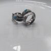 Stainless steel feather ring with dragon stone