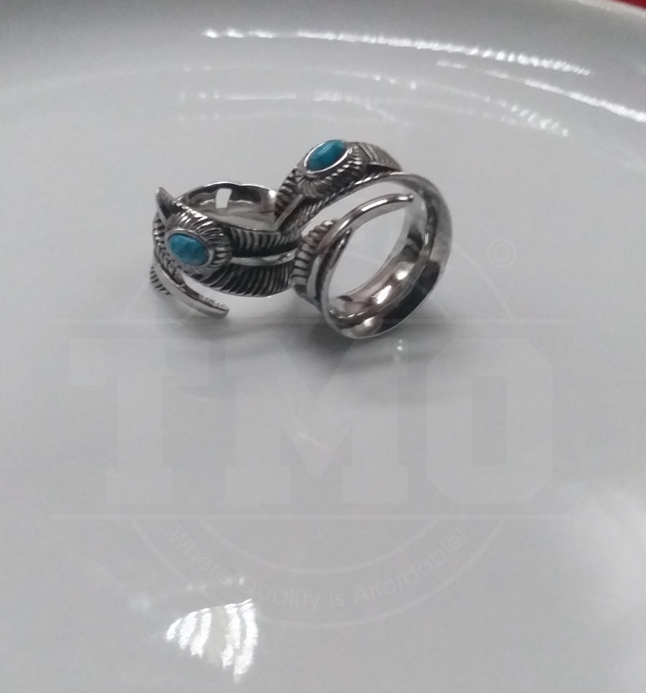 Stainless steel feather ring with dragon stone