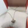 Heart shaped crystal ball necklace with wings